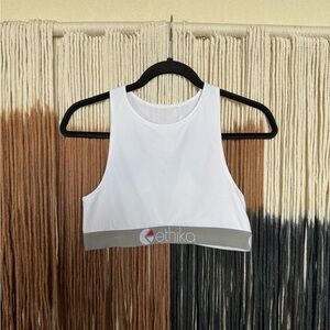 White Ethika high neck mesh style sports bra with a grey elastic band